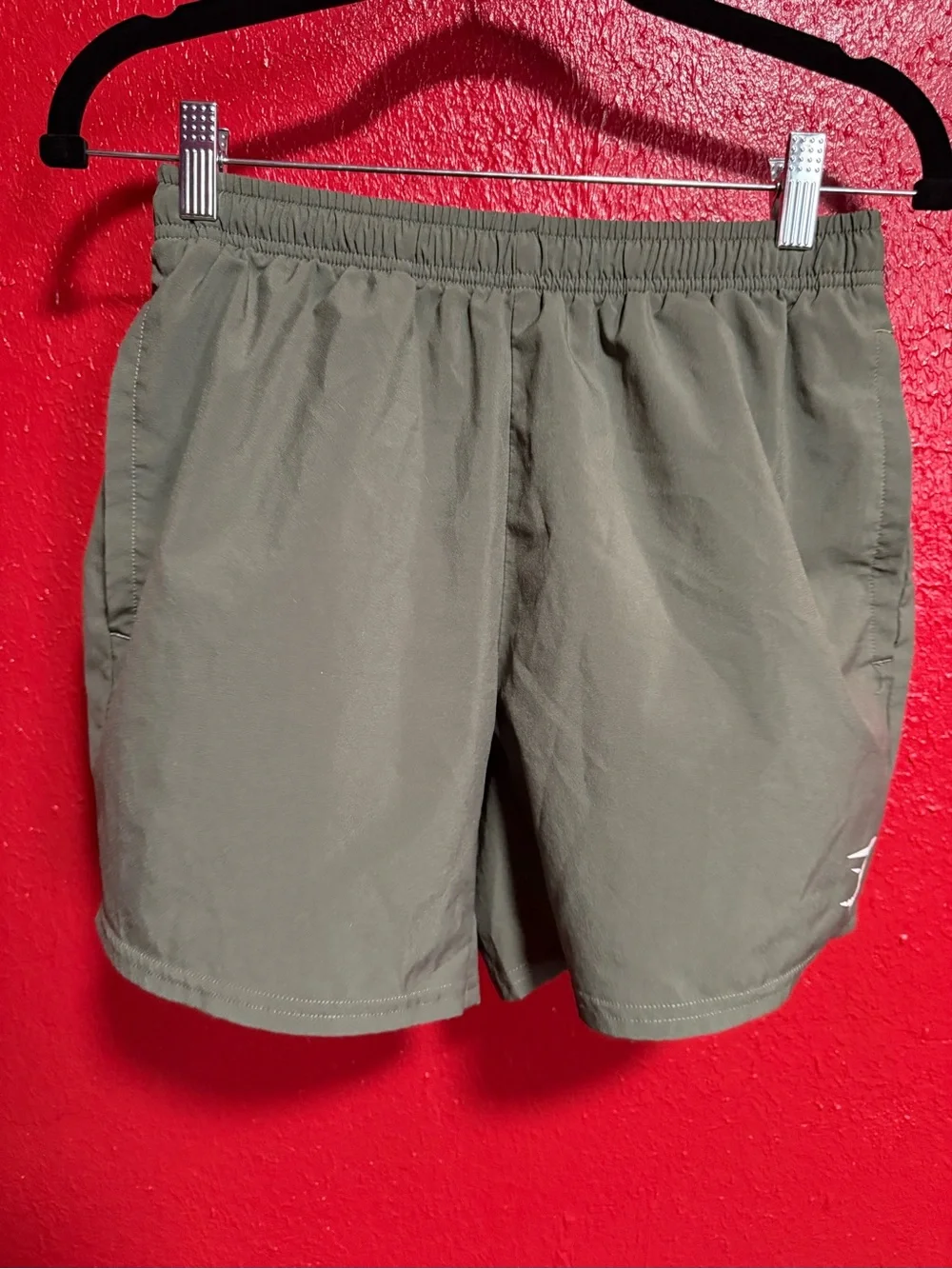 27. Preloved Men’s Gymshark Olive Green Athletic Drawstring Shorts